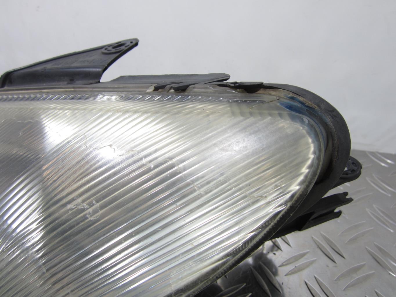 Optique avant principal gauche (feux)(phare) PEUGEOT 206 PHASE 1 – 9640559580 / 89005132