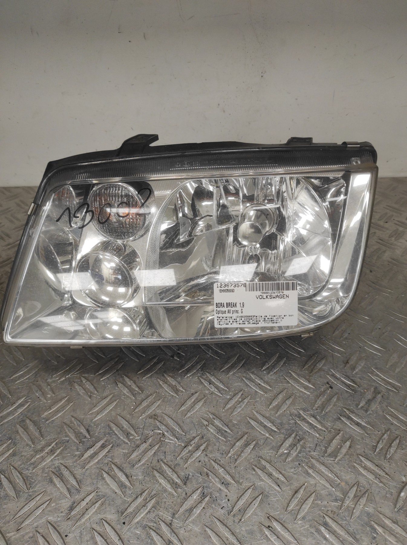 Optique avant principal gauche (feux)(phare) VOLKSWAGEN BORA BREAK – 1EH96356063
