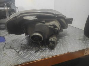 Optique avant principal gauche (feux)(phare) RENAULT TRAFIC 2 PHASE 1 – 7700311371